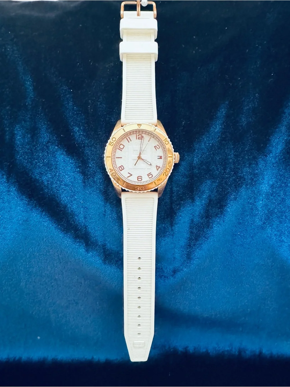 Tommy Hilfiger, vintage(ish), rose-gold tone with a rubber watch band. SO COOL!